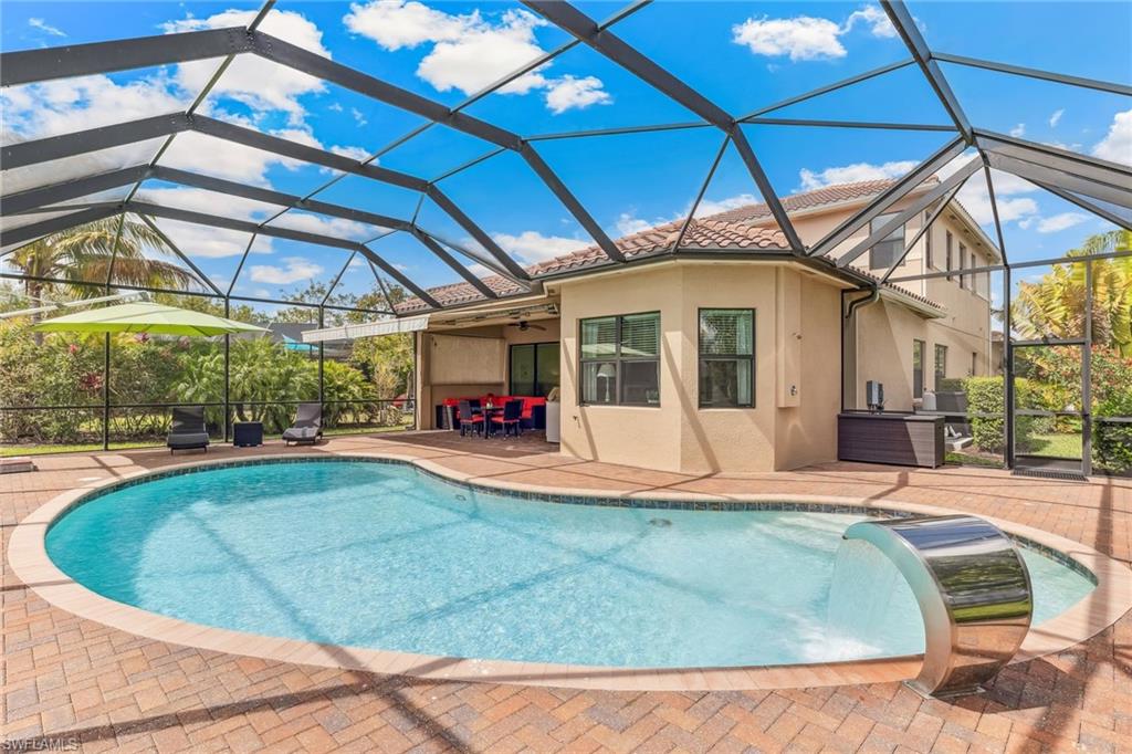 4360 Aurora Street Naples, FL 34119 - Photo 17 of 49 Pool with water feature