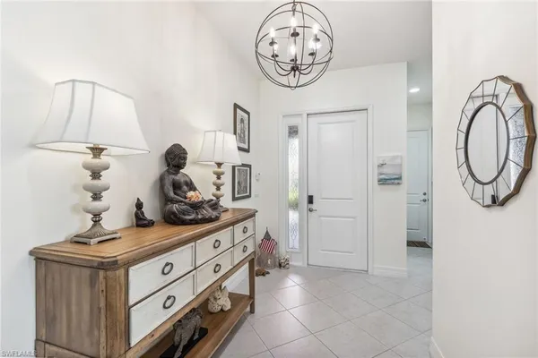 a view of a hallway with washer and dryer
