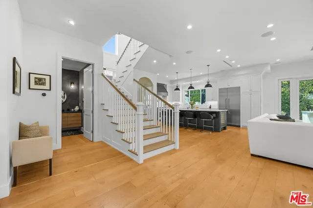 a view of entryway with wooden floor