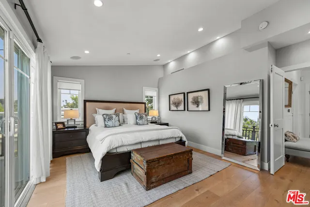 a bathroom with a double vanity sink mirror double and shower