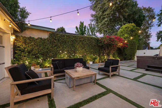 a view of a livingroom with furniture and window