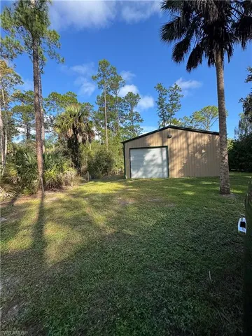 a view of storage and utility room with washer and dryer