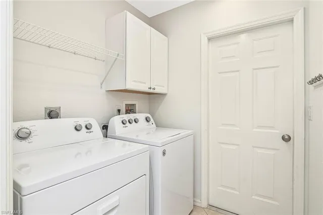 a house view with a sitting space and garden