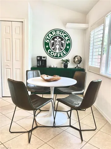 a view of a table and chairs in a room
