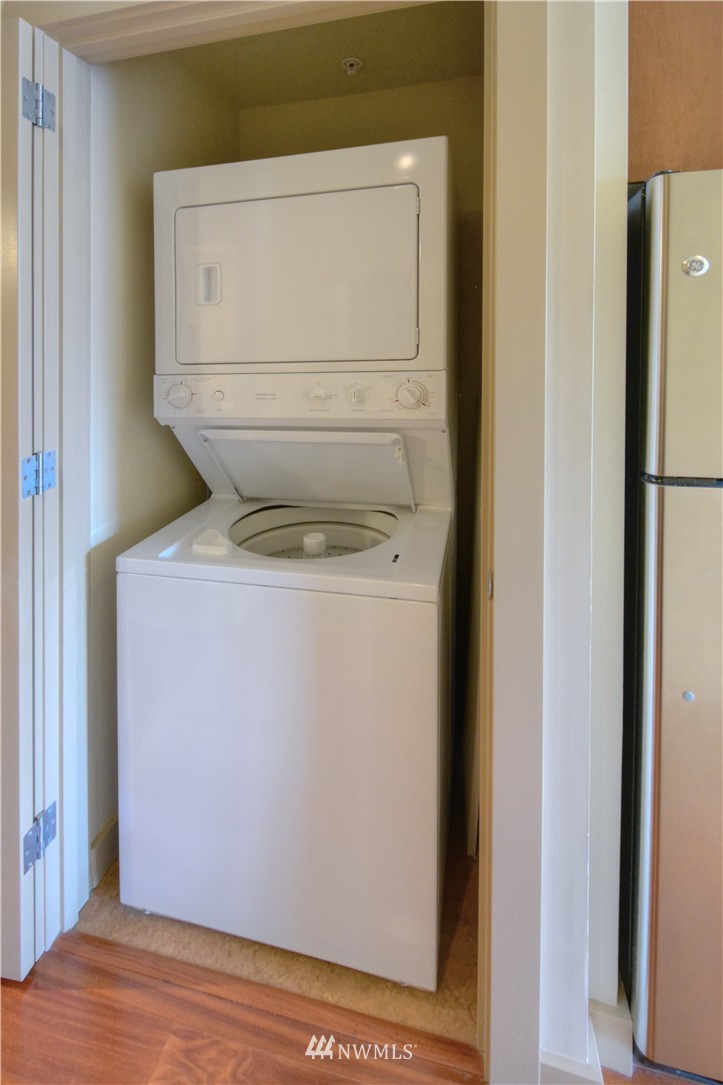900 Lenora Street, Unit W1105 Seattle, WA 98121 - Photo 16 of 25 a utility room with dryer and washer