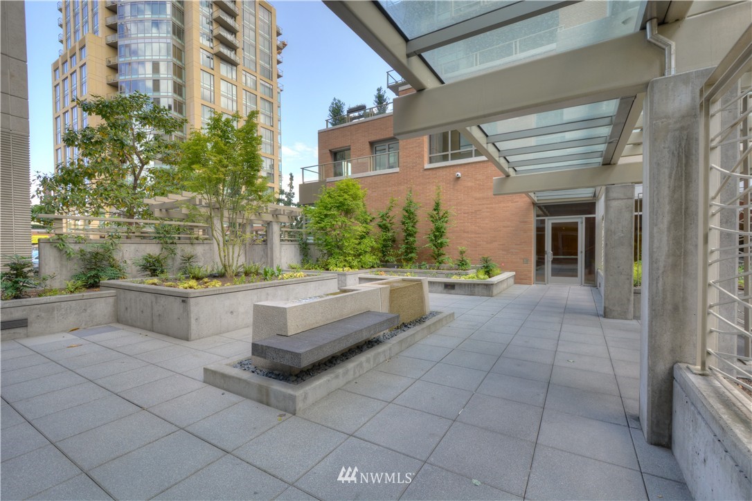 900 Lenora Street, Unit W1105 Seattle, WA 98121 - Photo 18 of 25 front view of a house with outdoor seating