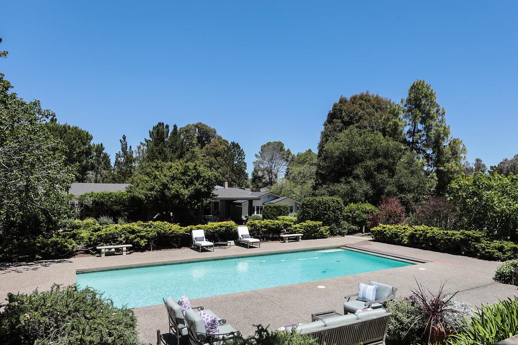 285 Ridgeway Road Woodside, CA 94062 - Photo 10 of 18 a view of a swimming pool and outdoor space