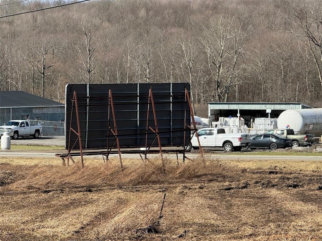 7700 Sharon-Mercer Road Mercer, PA 16137 - Photo 12 of 14 a view of a car parked in garage