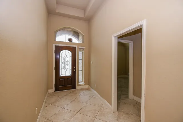a view of entryway with a front door
