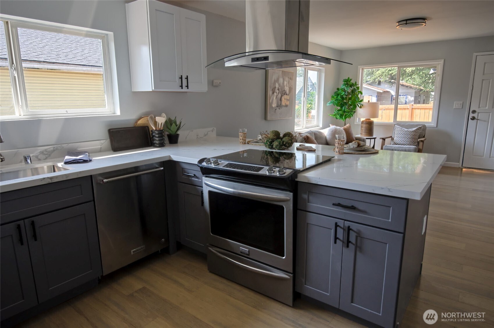 316 16th Avenue Longview, WA 98632 - Photo 5 of 19 a kitchen with stainless steel appliances a stove sink and window