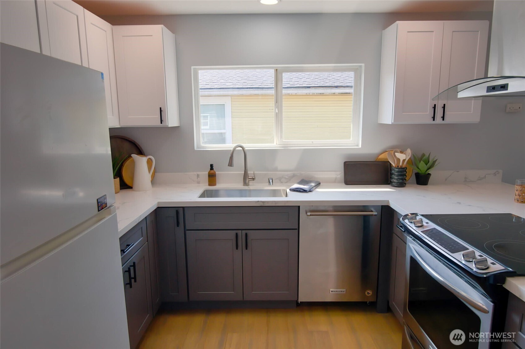 316 16th Avenue Longview, WA 98632 - Photo 7 of 19 a kitchen with a sink cabinets and window
