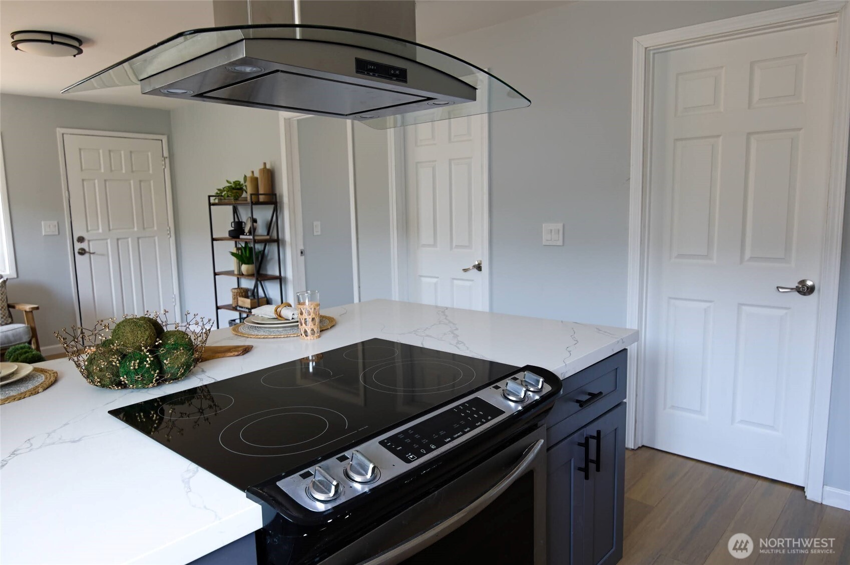316 16th Avenue Longview, WA 98632 - Photo 8 of 19 a kitchen with a stove and a cabinet