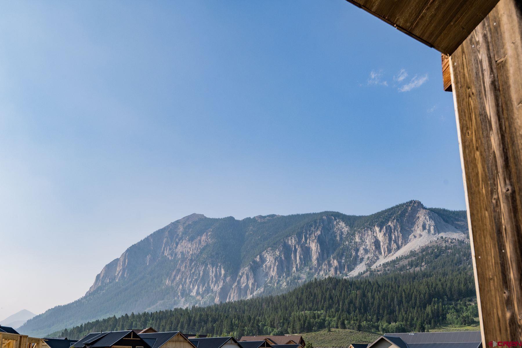 180 Elk Valley Road, Unit 109 Crested Butte, CO 81224 - Photo 24 of 36 a view of a sky from a balcony