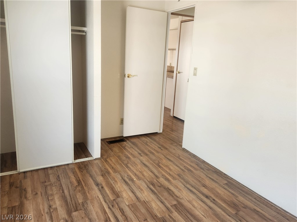 3189 Del Monte Street Laughlin, NV 89029 - Photo 19 of 32 Laminate flooring extends throughout this versatile room, offering clean lines and functional appeal.