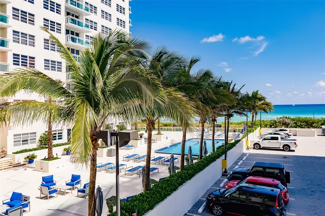 a front view of a building with garden