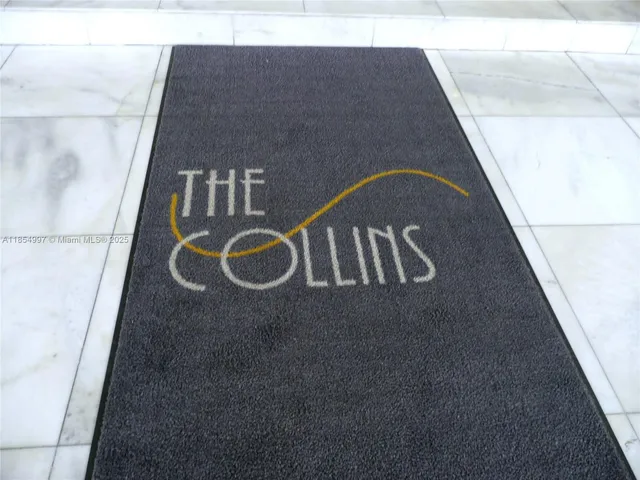 a view of a room with wooden walls