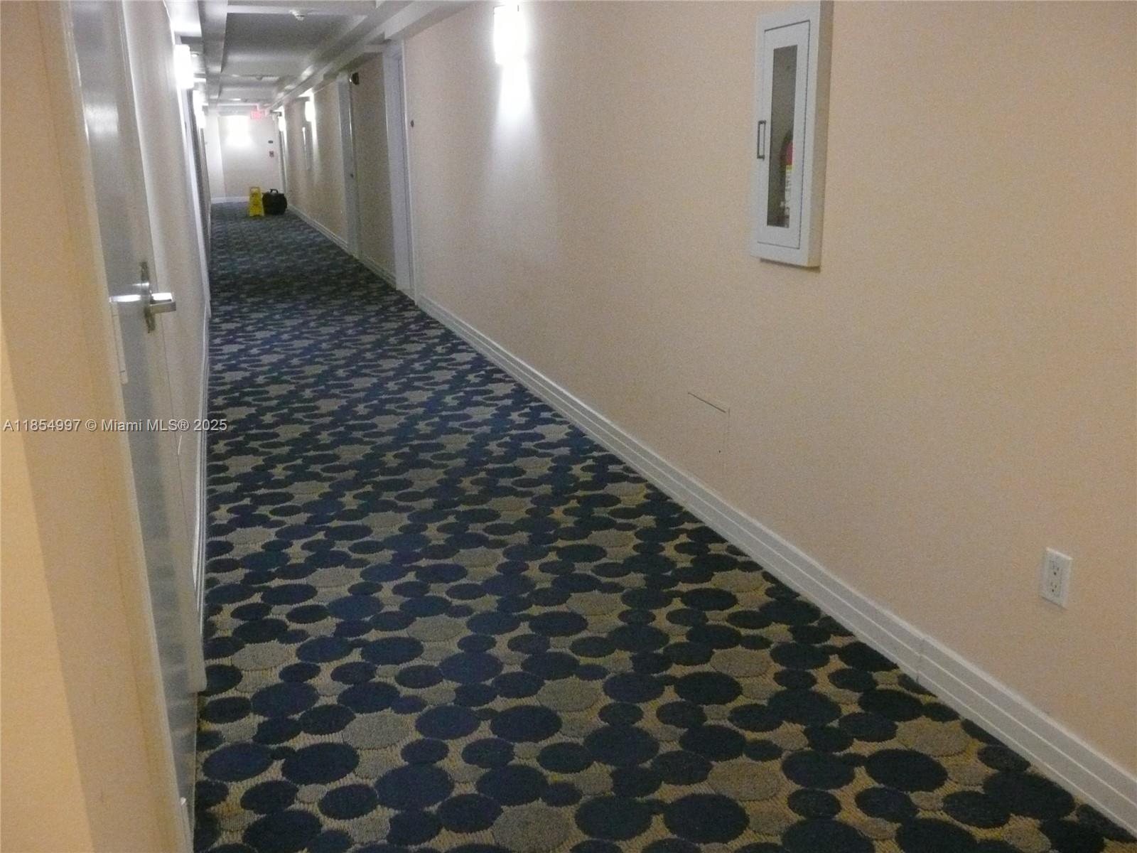 6917 Collins Avenue, Unit 408 Miami Beach, FL 33141 - Photo 30 of 39 a bathroom with a bathtub