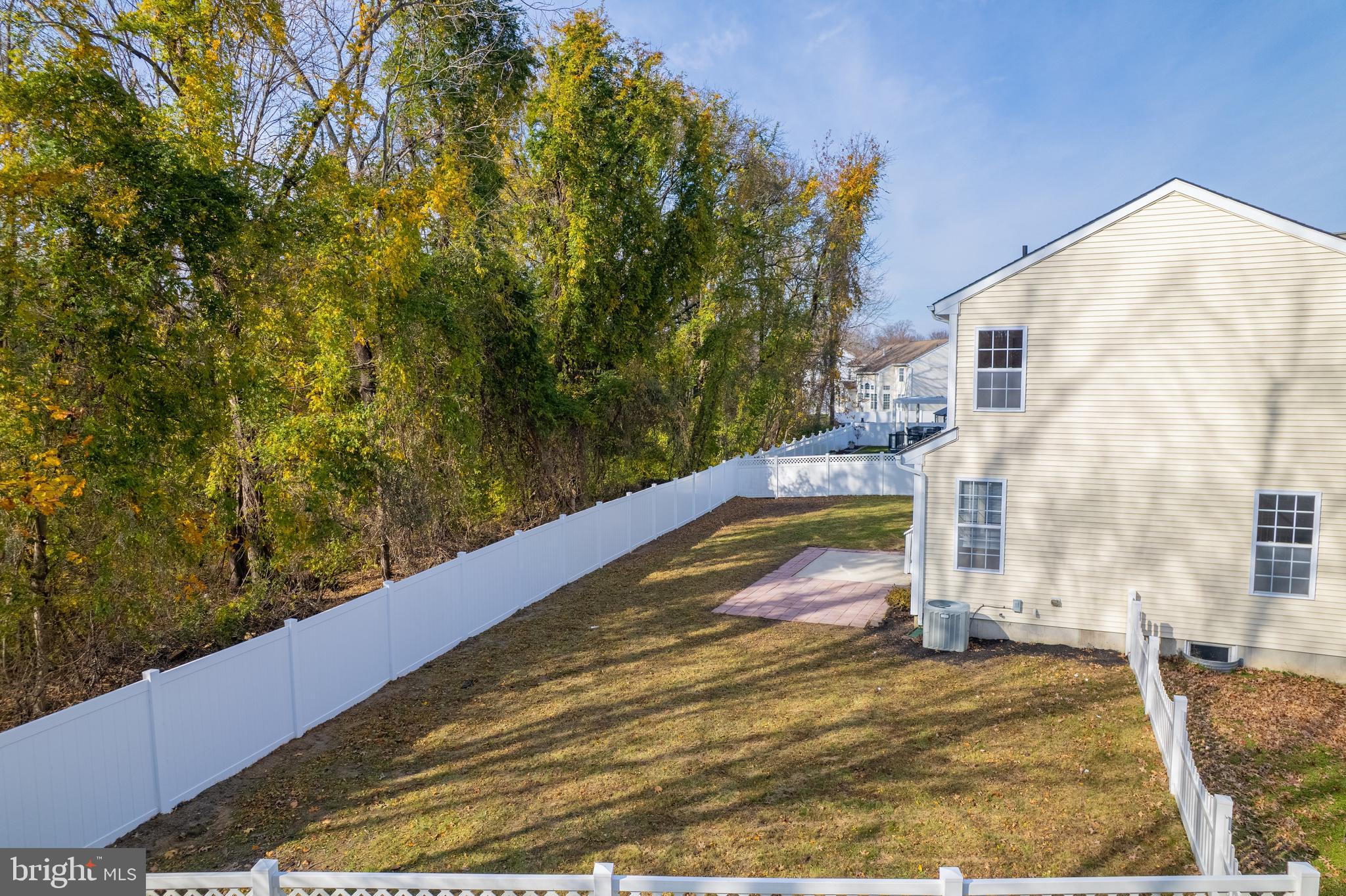 23 Homestead Drive Pemberton, NJ 08068 - Photo 12 of 40 a view of a big yard with potted plants
