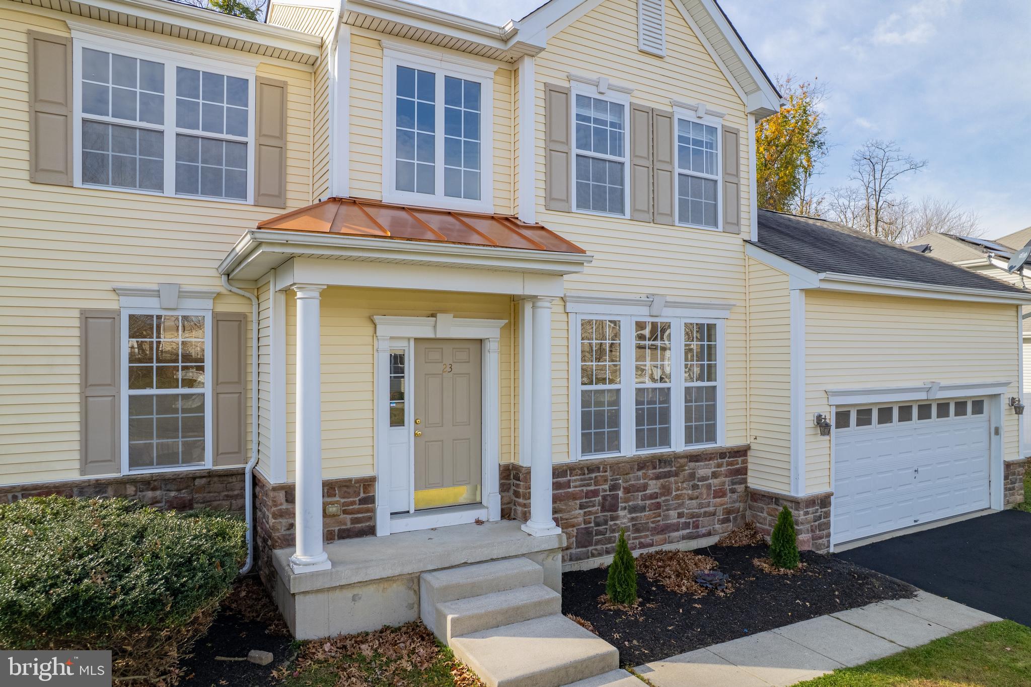 23 Homestead Drive Pemberton, NJ 08068 - Photo 17 of 40 a front view of a house with glass windows