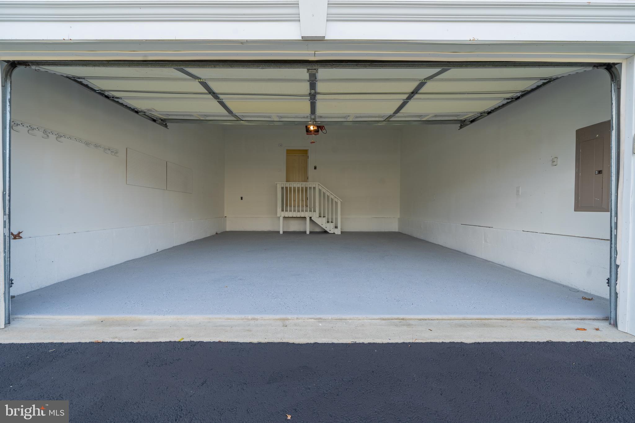 23 Homestead Drive Pemberton, NJ 08068 - Photo 18 of 40 a view of a room with racks on the wall