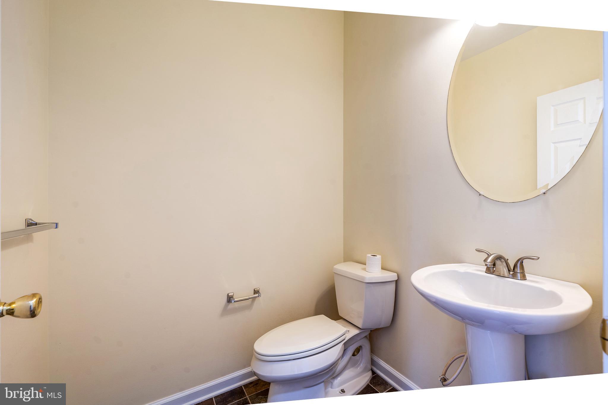 23 Homestead Drive Pemberton, NJ 08068 - Photo 27 of 40 a bathroom with a sink and a toilet