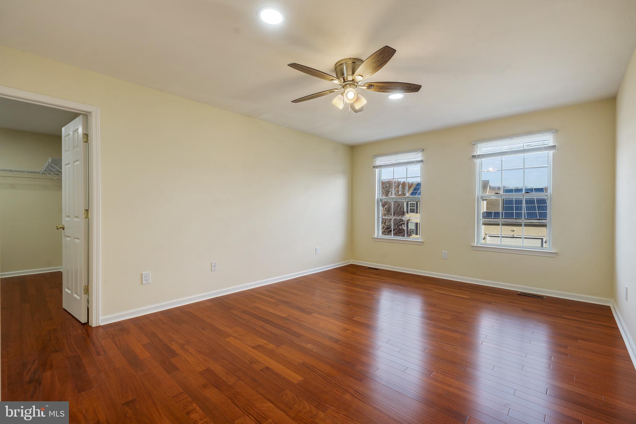 23 Homestead Drive Pemberton, NJ 08068 - Photo 31 of 40 a view of an empty room with wooden floor and a window