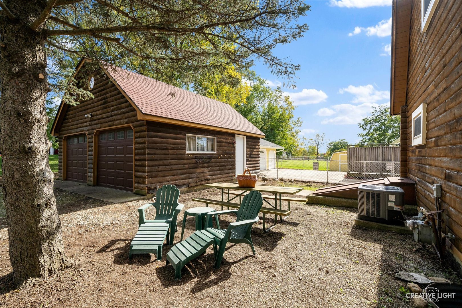 S011 County Farm Road Winfield, IL 60190 - Photo 17 of 18 a view of backyard with outdoor seating