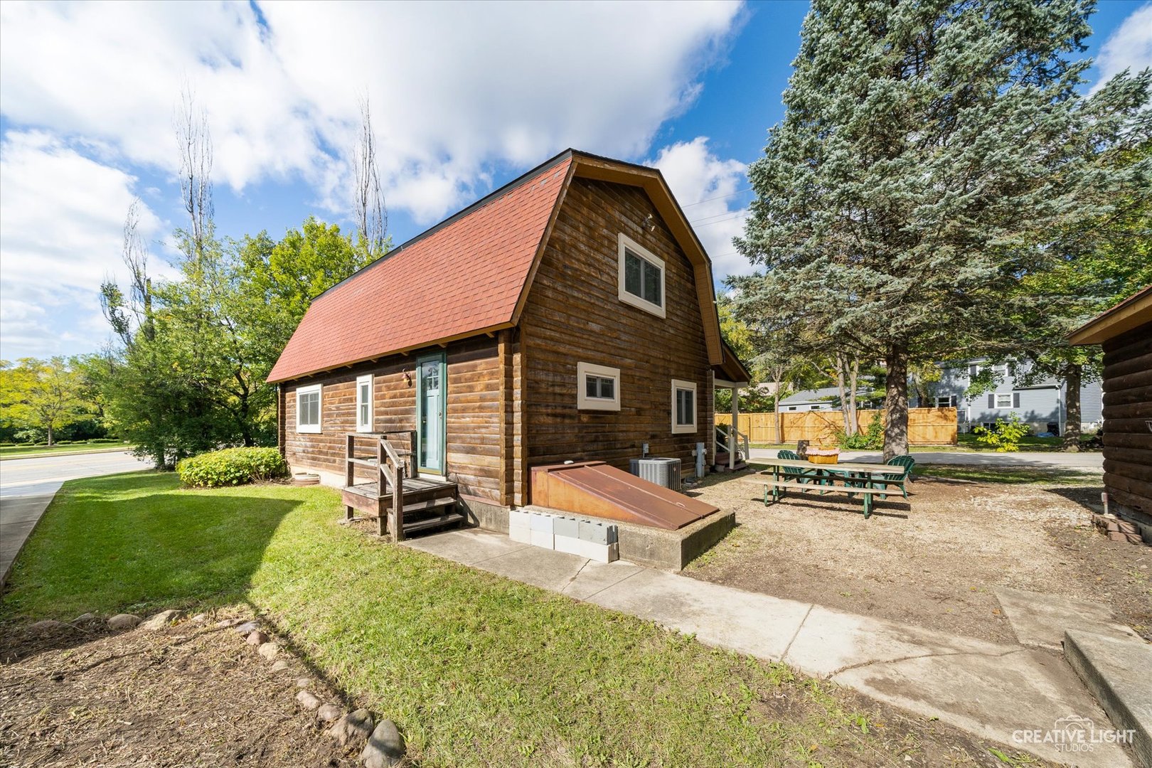 S011 County Farm Road Winfield, IL 60190 - Photo 18 of 18 a view of a house with a yard patio and slide