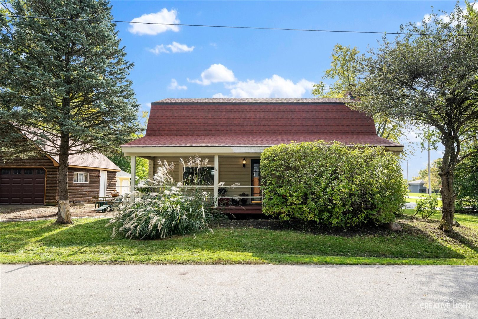 S011 County Farm Road Winfield, IL 60190 - Photo 2 of 18 a front view of a house with a garden
