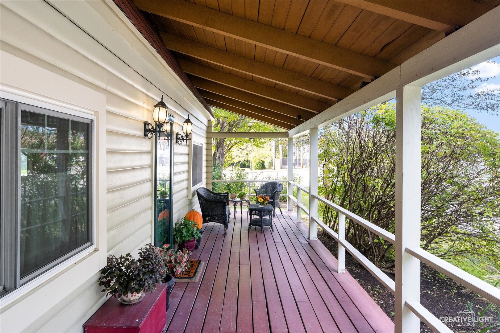 S011 County Farm Road Winfield, IL 60190 - Photo 3 of 18 a view of porch with wooden floor and outdoor seating