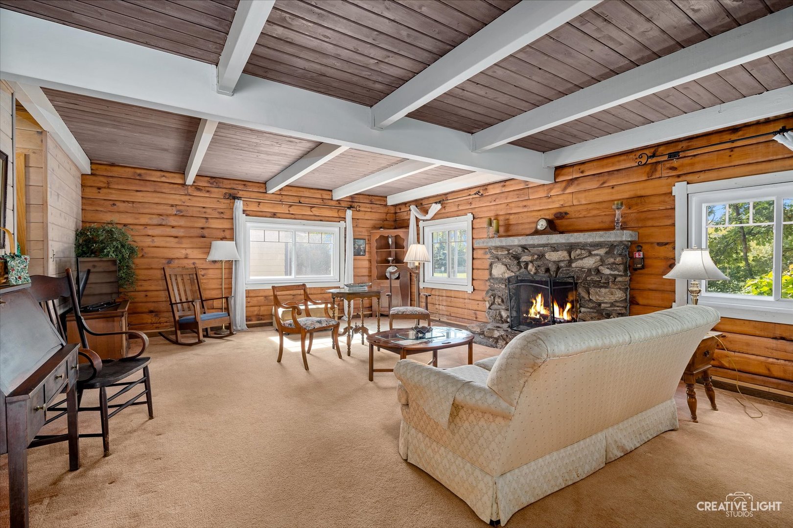 S011 County Farm Road Winfield, IL 60190 - Photo 5 of 18 a living room with furniture a fireplace and a table