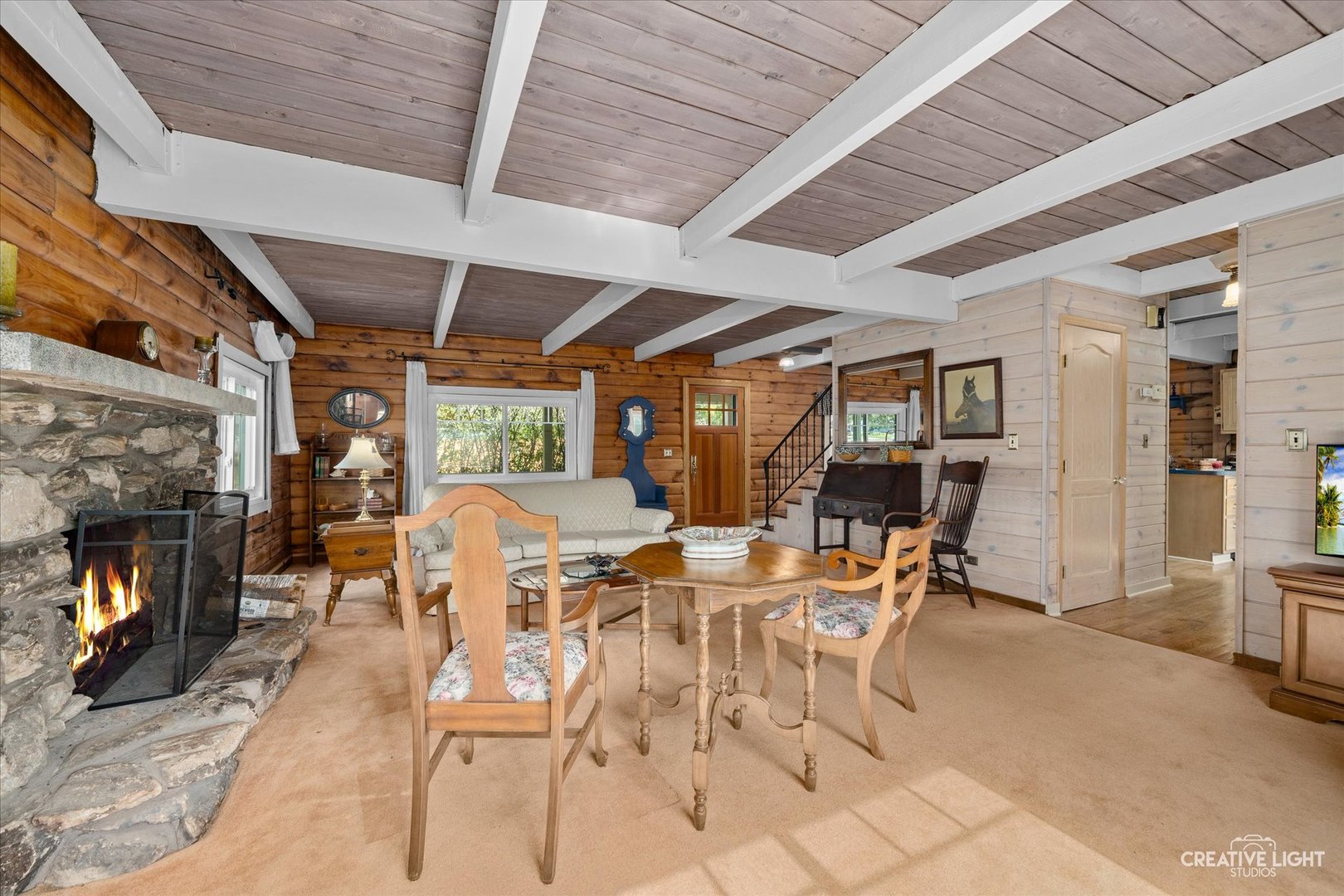 S011 County Farm Road Winfield, IL 60190 - Photo 6 of 18 a dining room with furniture and a fireplace