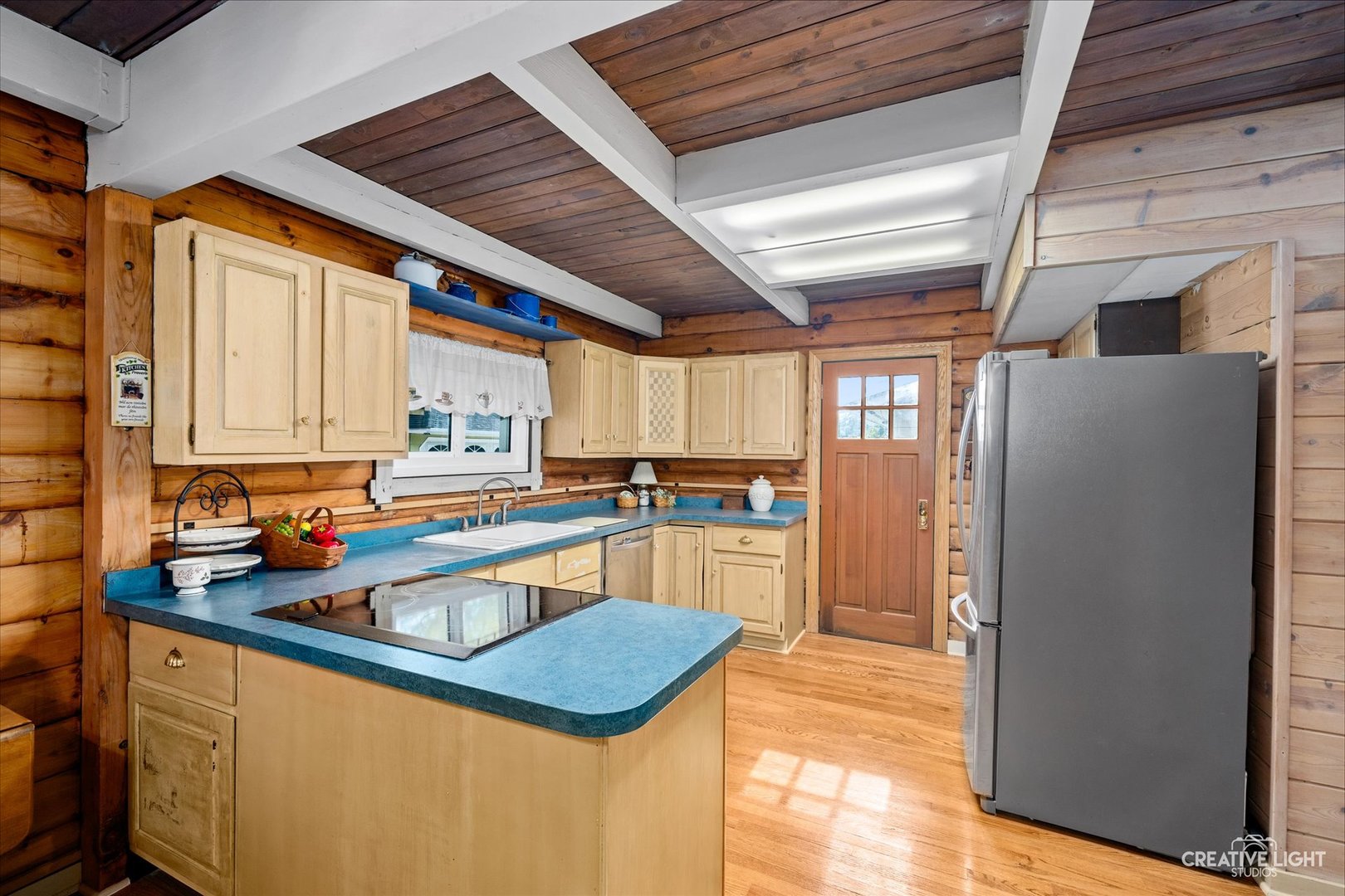 S011 County Farm Road Winfield, IL 60190 - Photo 7 of 18 a kitchen with stainless steel appliances granite countertop a sink and a refrigerator