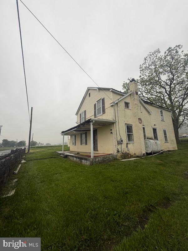13804 Mercersburg Road Clear Spring, MD 21722 - Photo 48 of 48 a white house that has a big yard with wooden fence
