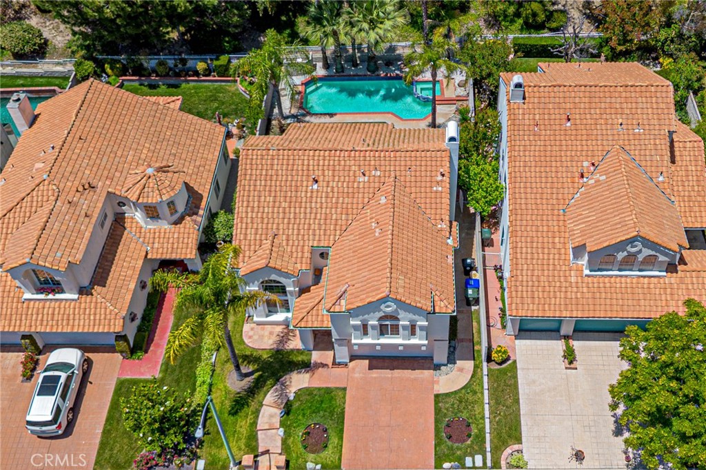 25533 Longfellow Place Stevenson Ranch, CA 91381 - Photo 40 of 47 an aerial view of a house with garden space and street view