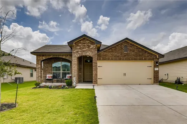 a front view of house with yard