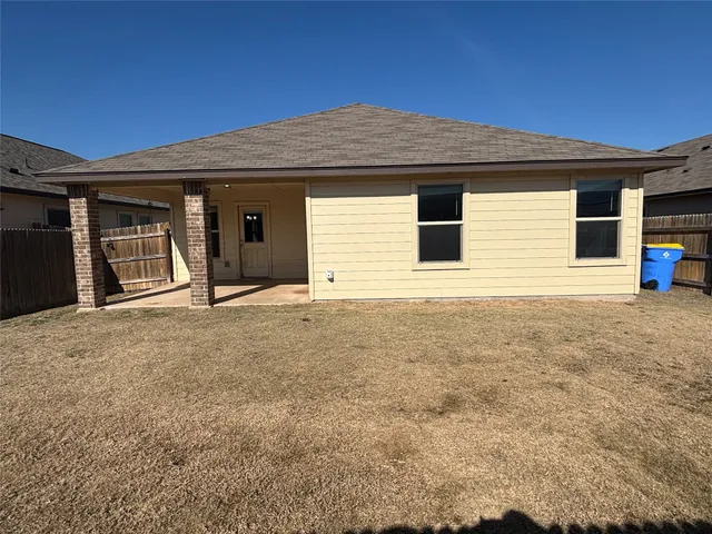 a view of a house with a patio