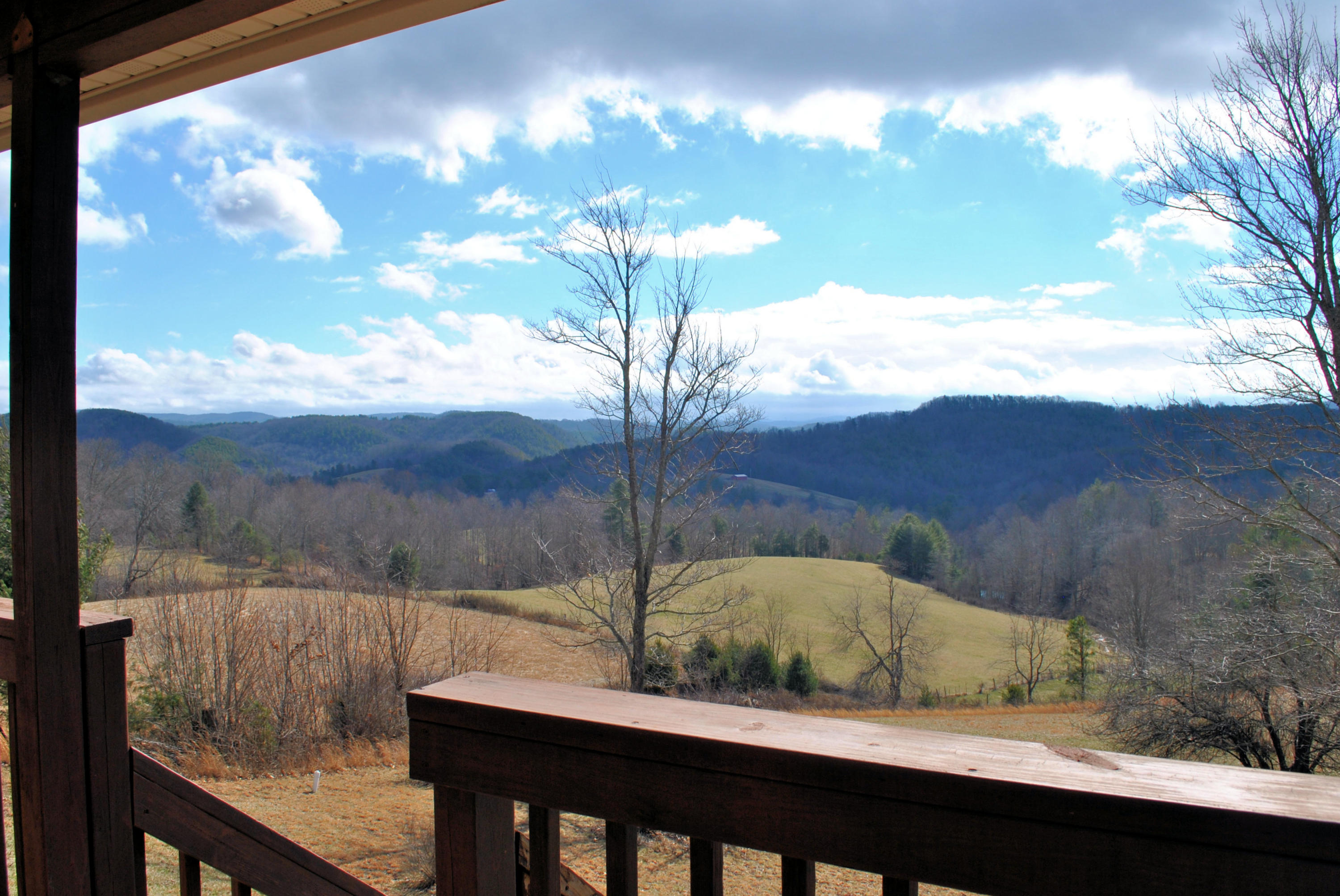 207 Timber Ridge Road Northwest Willis, VA 24380 - Photo 22 of 86 a view of a lake from a balcony