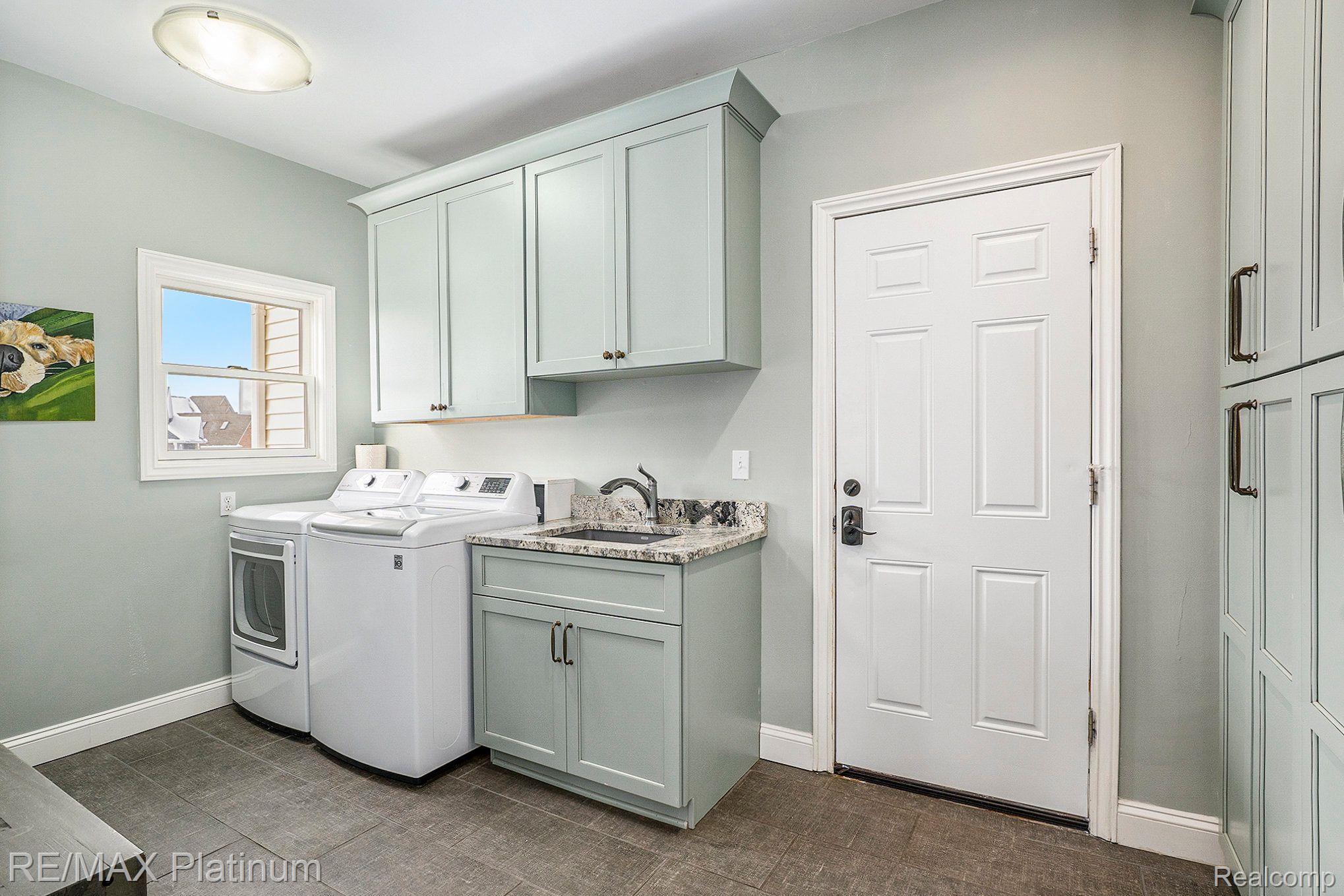 1112 Thorn Ridge Drive Howell, MI 48843 - Photo 8 of 30 Main Floor Laundry Room