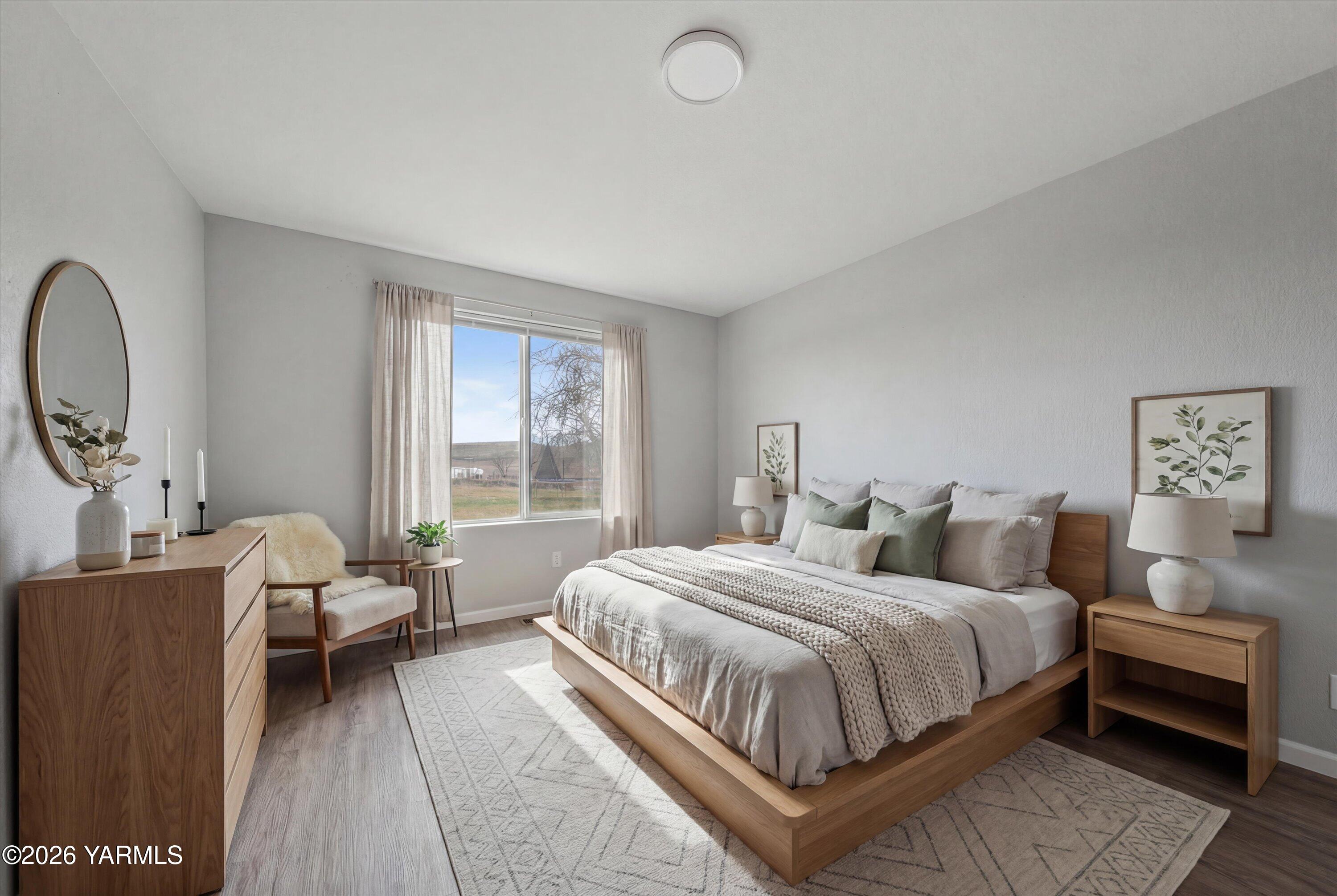 460 Sun Acres Road Zillah, WA 98953 - Photo 11 of 45 a bedroom with a bed and a couch