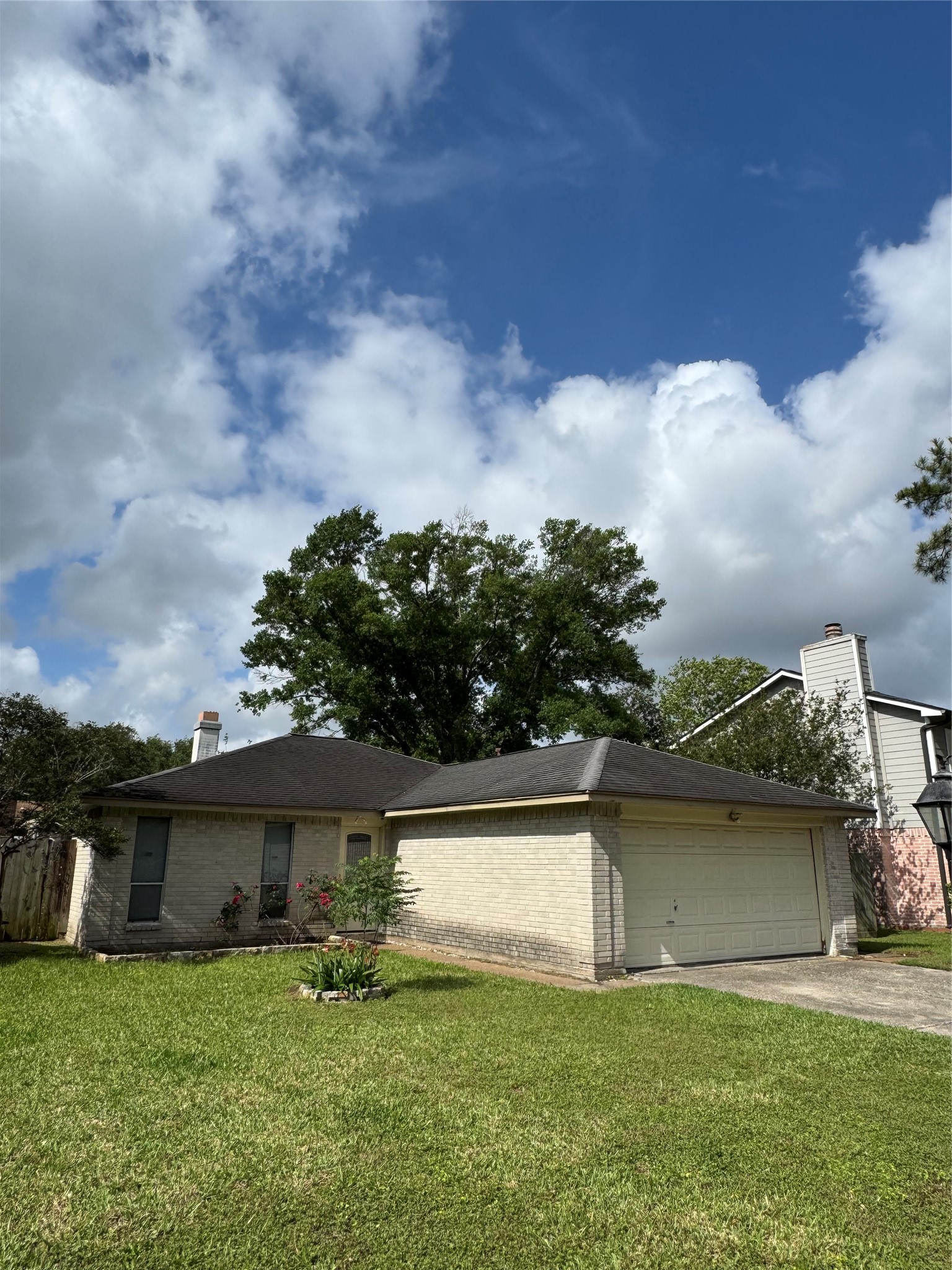 4435 Brookhead Trail Houston, TX 77066 - Photo 2 of 20 a front view of a house with a garden and yard