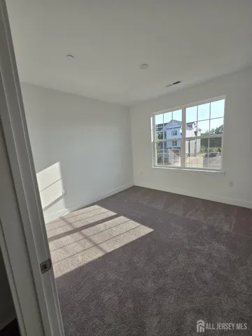 a bathroom with a bathtub and a sink