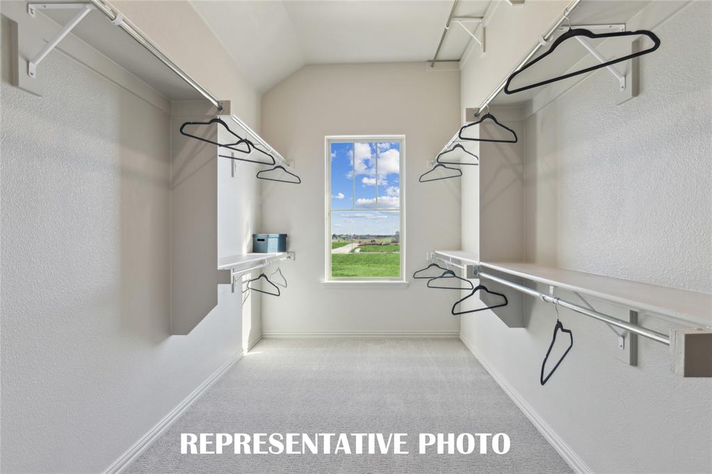 1017 Magdalena Way Midlothian, TX 76065 - Photo 13 of 18 a bathroom with a bathtub and a shower