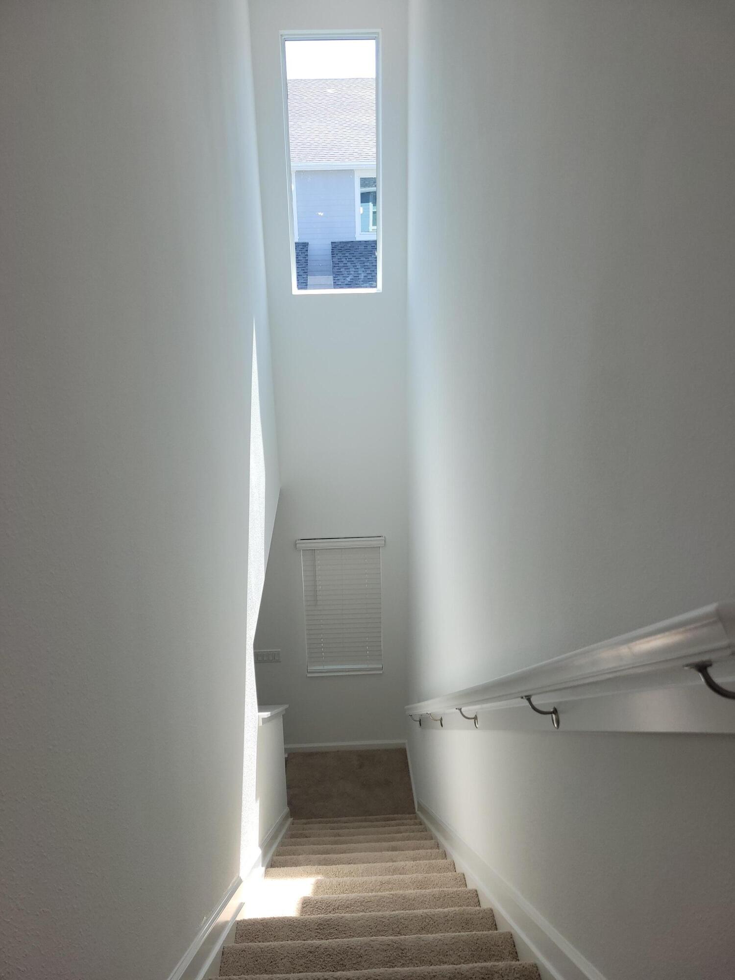 Undisclosed Address Loxahatchee, FL 33470 - Photo 13 of 17 a view of an empty walk in closet