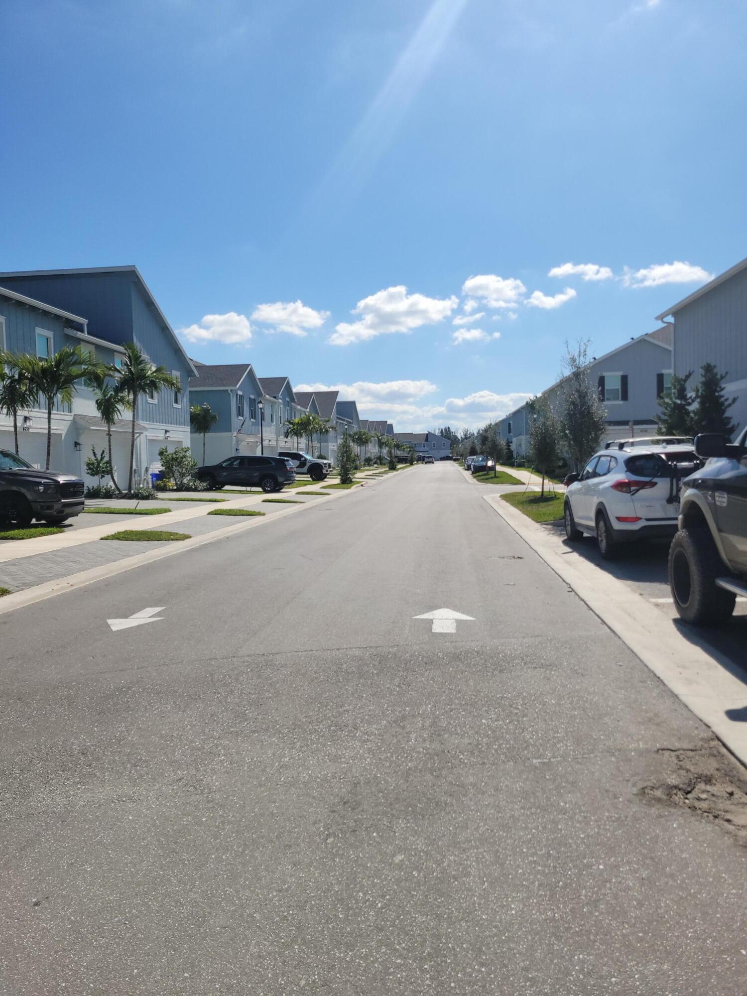 Undisclosed Address Loxahatchee, FL 33470 - Photo 15 of 17 a view of a city street with a building