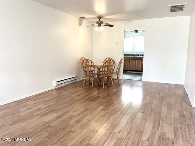 38 Keene Street, Unit 70 Whiting, NJ 08759 - Photo 3 of 10 a view of a livingroom with furniture and a ceiling fan