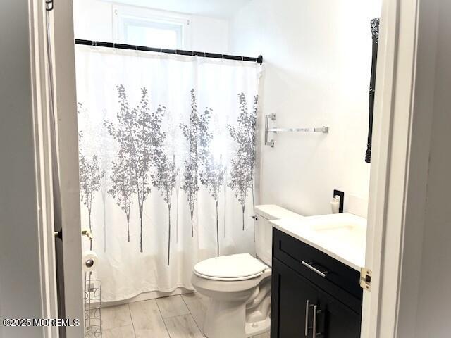38 Keene Street, Unit 70 Whiting, NJ 08759 - Photo 4 of 10 a bathroom with a sink toilet and shower