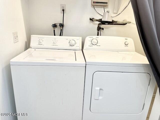 38 Keene Street, Unit 70 Whiting, NJ 08759 - Photo 5 of 10 a utility room with dryer and washer