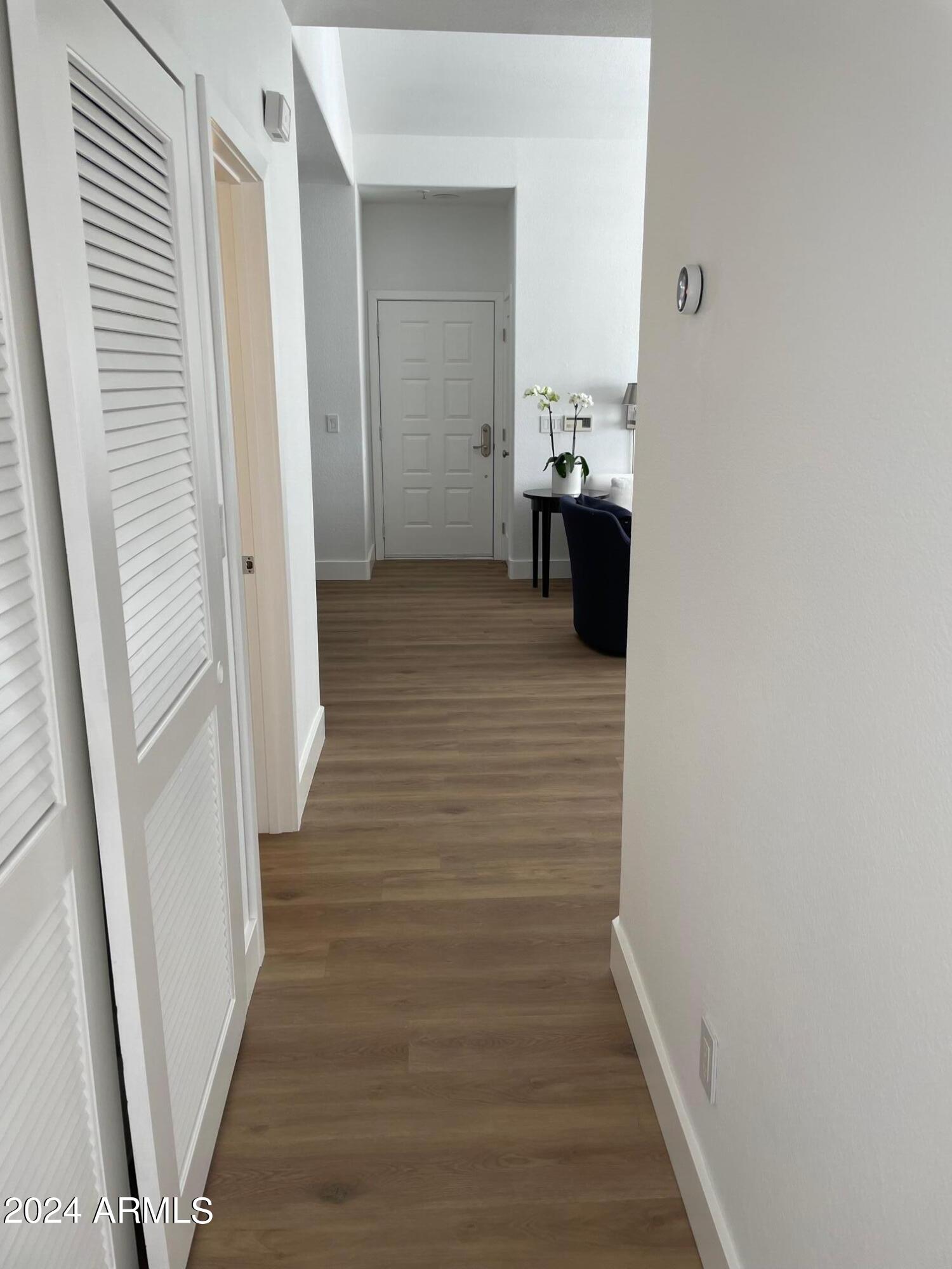 7710 East Gainey Ranch Road, Unit 214 Scottsdale, AZ 85258 - Photo 14 of 23 Hallway to Master