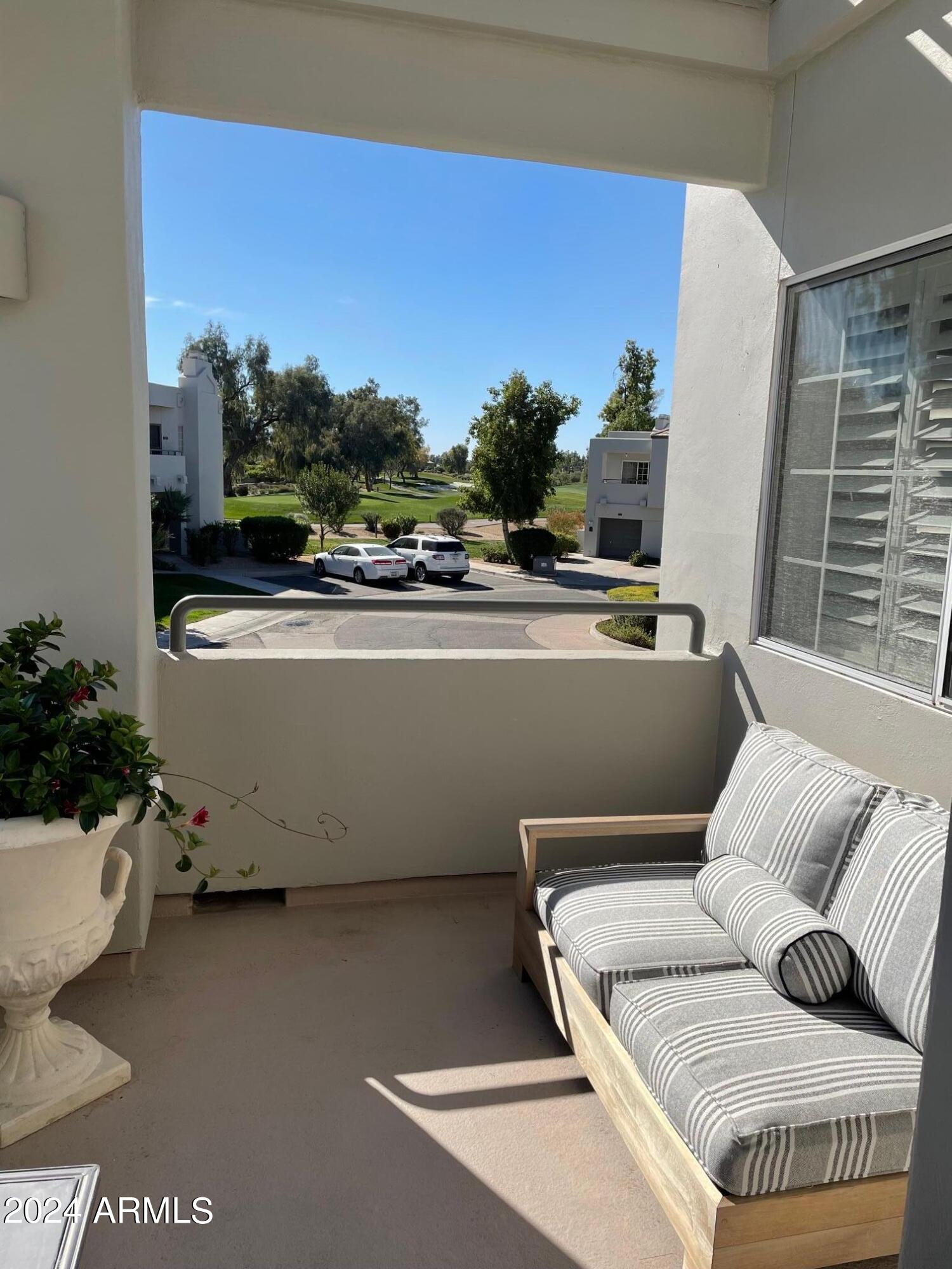 7710 East Gainey Ranch Road, Unit 214 Scottsdale, AZ 85258 - Photo 2 of 23 Front Patio